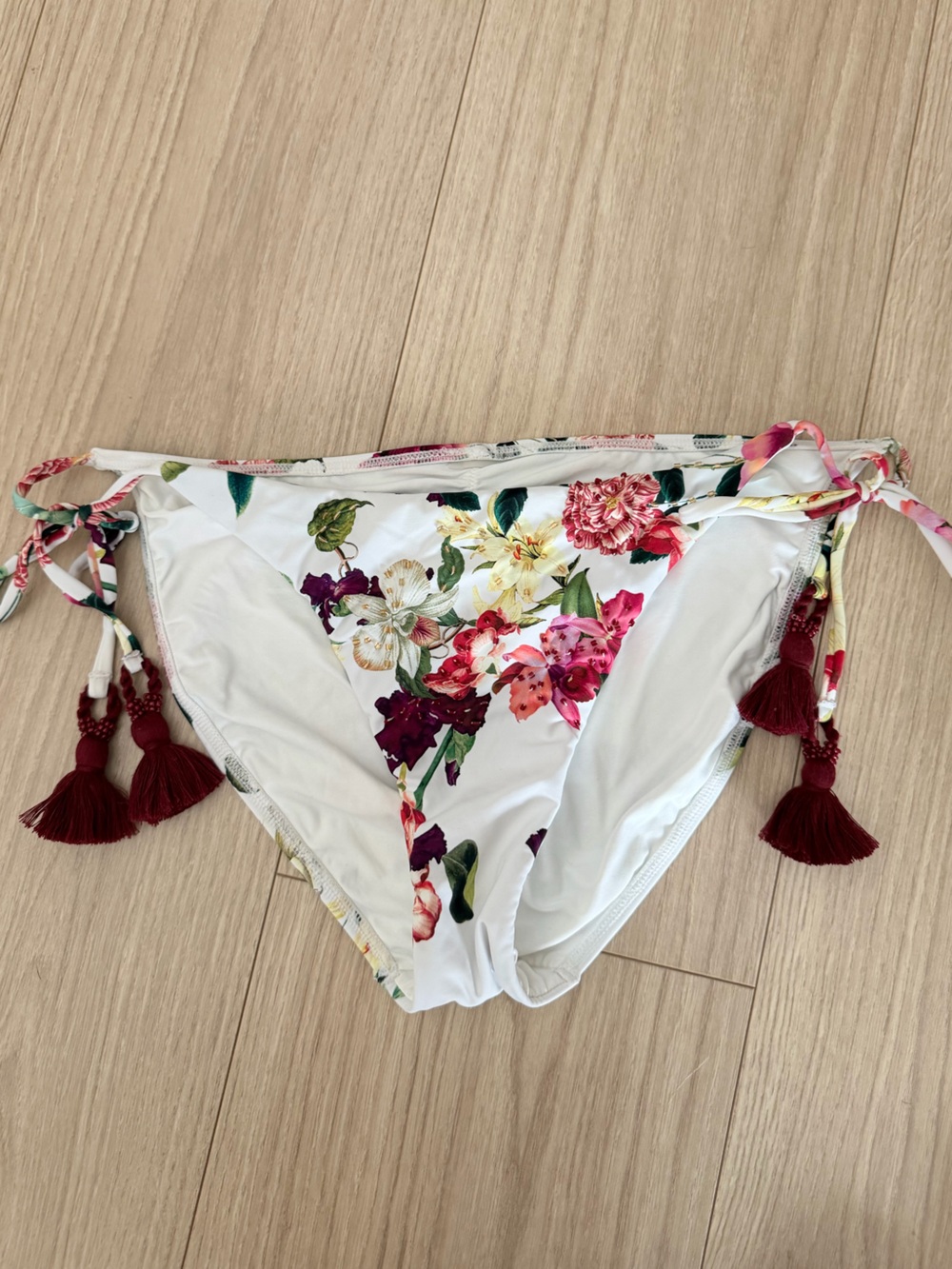 PQ Swim White Floral Tie-Side Bikini Bottom with Burgundy Tassels
